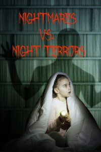 image of a girl under the covers with a flashlight the night afraid of ghosts
