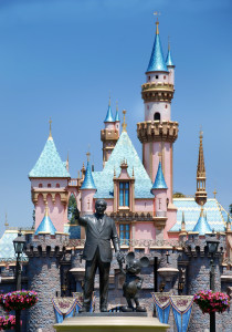 monument to walt disney and mickey mouse in disneyland california and cinderella castle